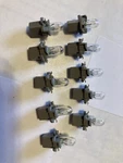 10 Pcs Ford New F3XY13B765C 99-04 Mustang Taurus Sable Cluster Socket & Bulb. Fixed Price $16.00.