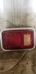Driver Left Tail Light With Bezel Fits 83-93 Dodge 150 Van 121668. Fixed Price $80.00.